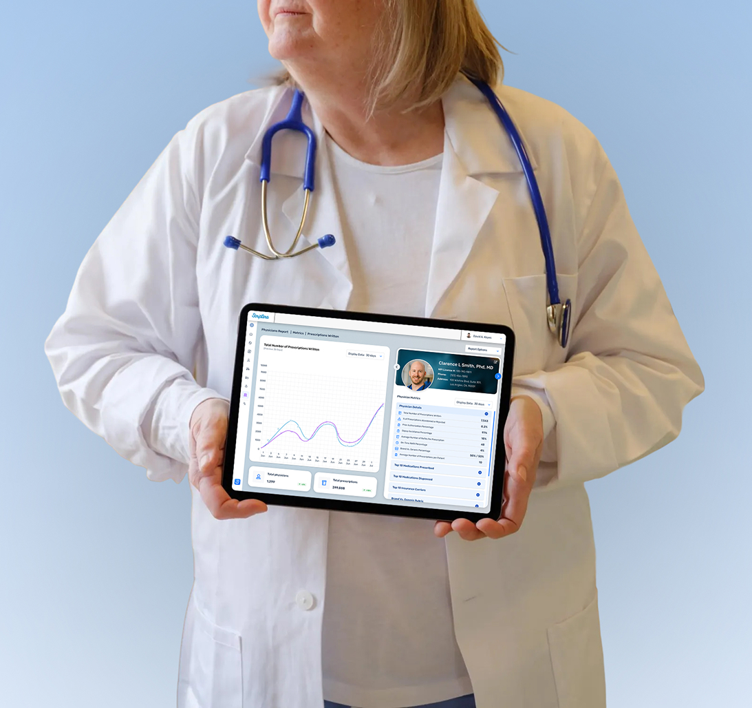 A physician in a white coat holding a tablet showing a Scriptera report.