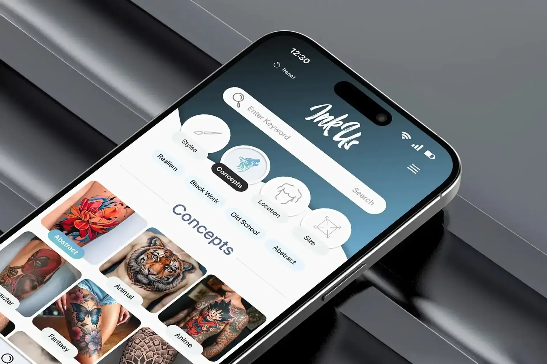 A phone showing the Ink Us concepts screen.
